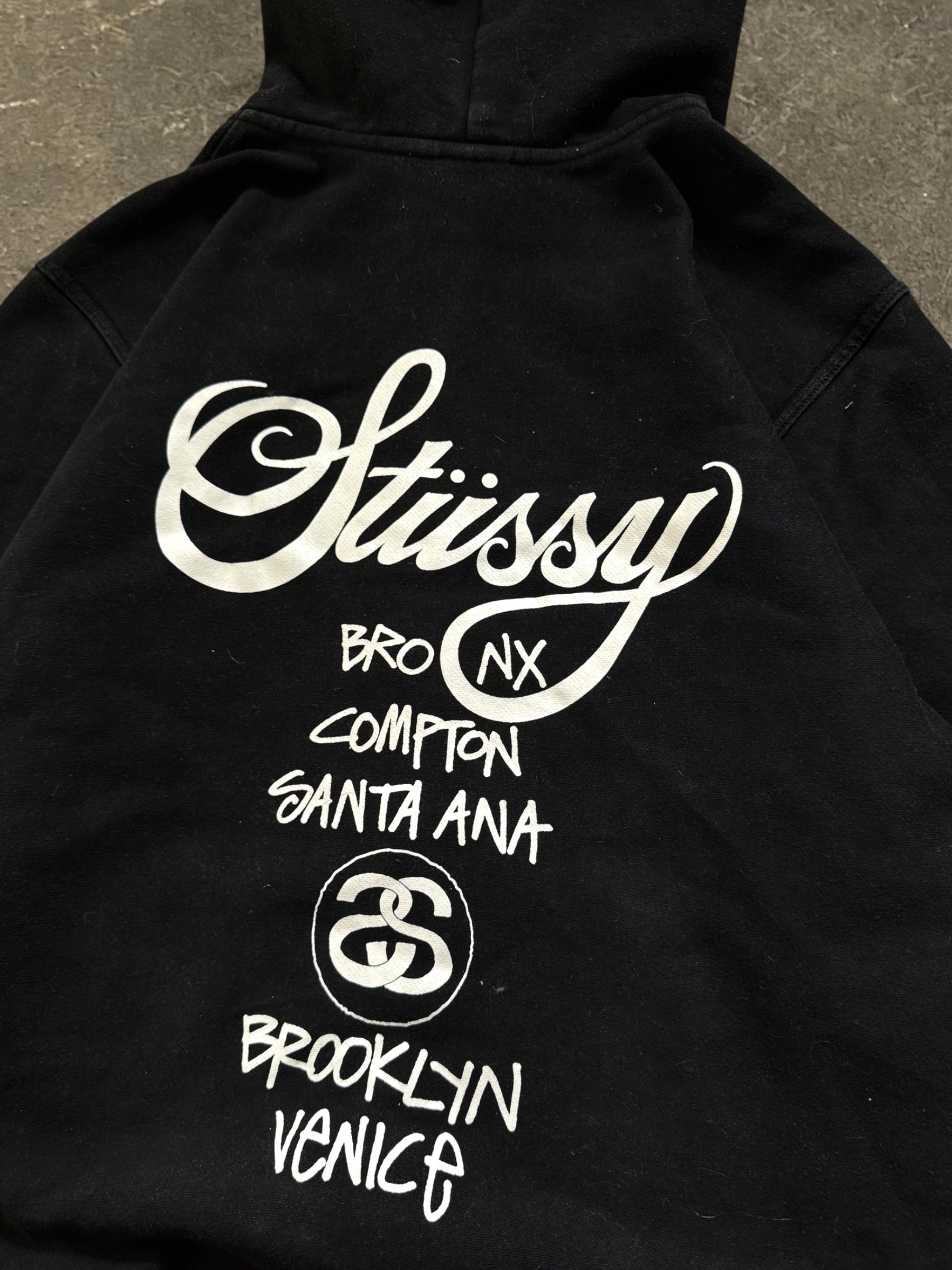 STÜSSY BLACK WORLD TOUR ZIP-UP HOODIE