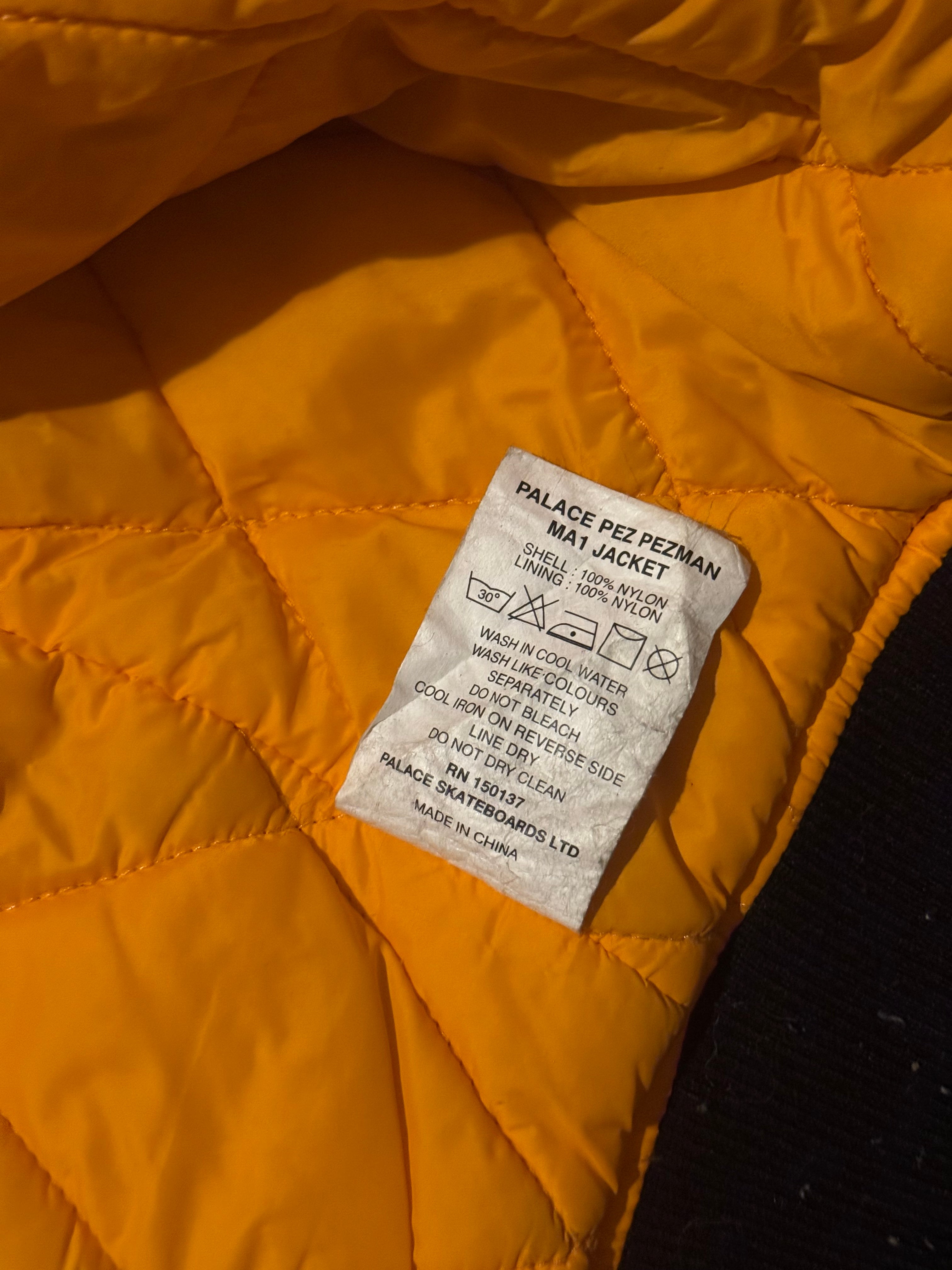 PALACE X PEZ PEZMAN MA1 BOMBER JACKET